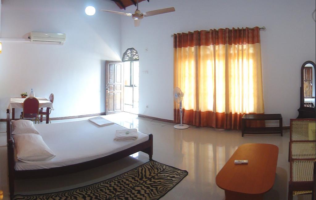 פינאוואלה Green Land Guest House חדר תמונה