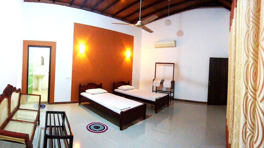 פינאוואלה Green Land Guest House חדר תמונה