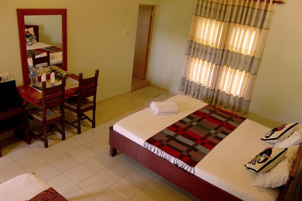 פינאוואלה Green Land Guest House חדר תמונה